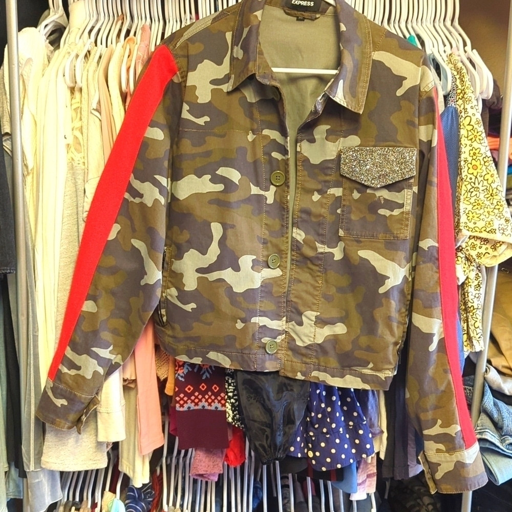 Express camo denim jacket rhinestone pocket.